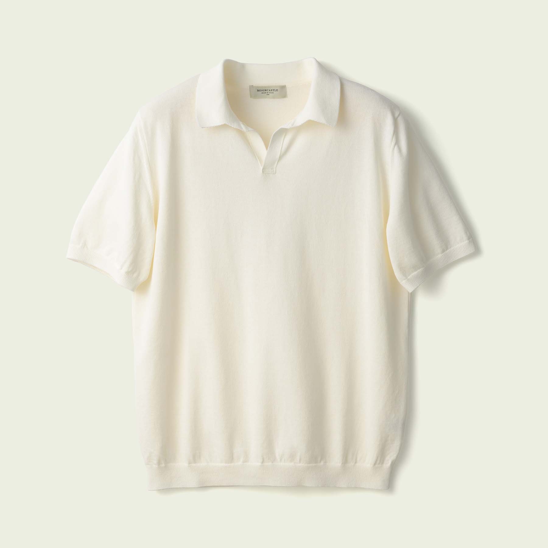 Off-white men's cotton skipper polo-neck shirt laid flat and centered in frame.