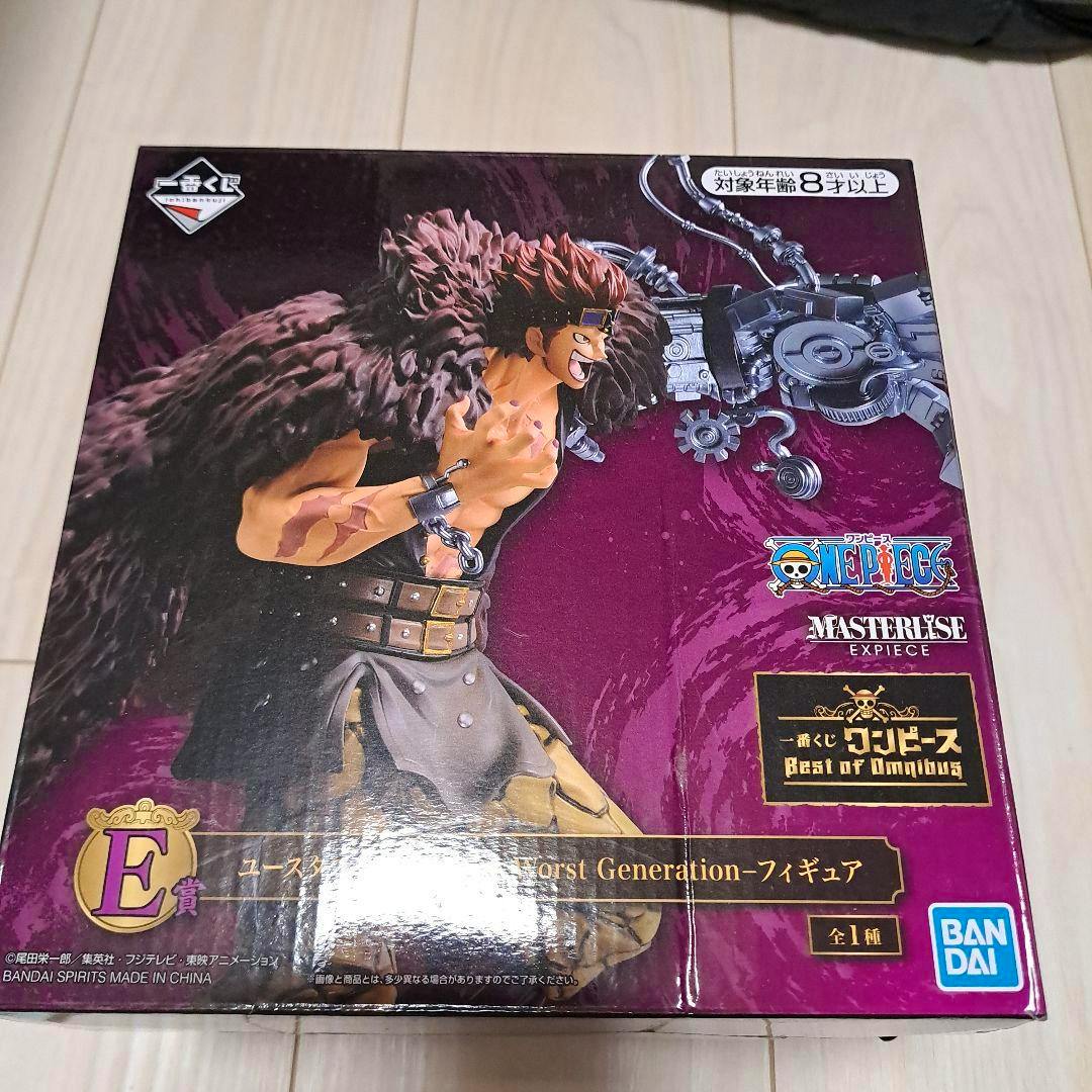 Front of the boxed One Piece E-prize figure showing box art of Eustass Kid and related logos.