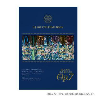 Front cover of the IDOLiSH7 LIVE BEYOND “Op.7” stage costume book with a dark blue background, a decorative costume image, and gold title text.