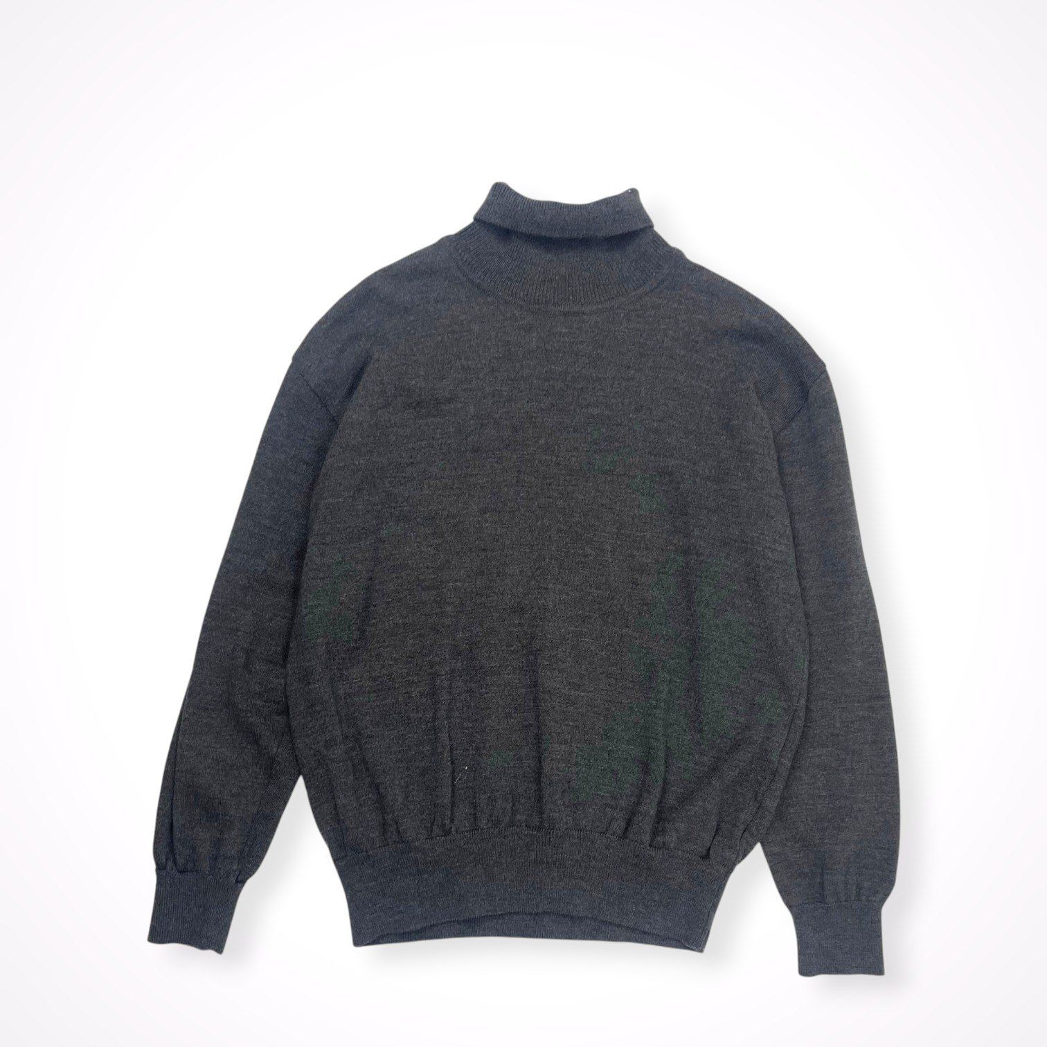 Flat-lay gray turtleneck wool sweater shown from the back on a white background.