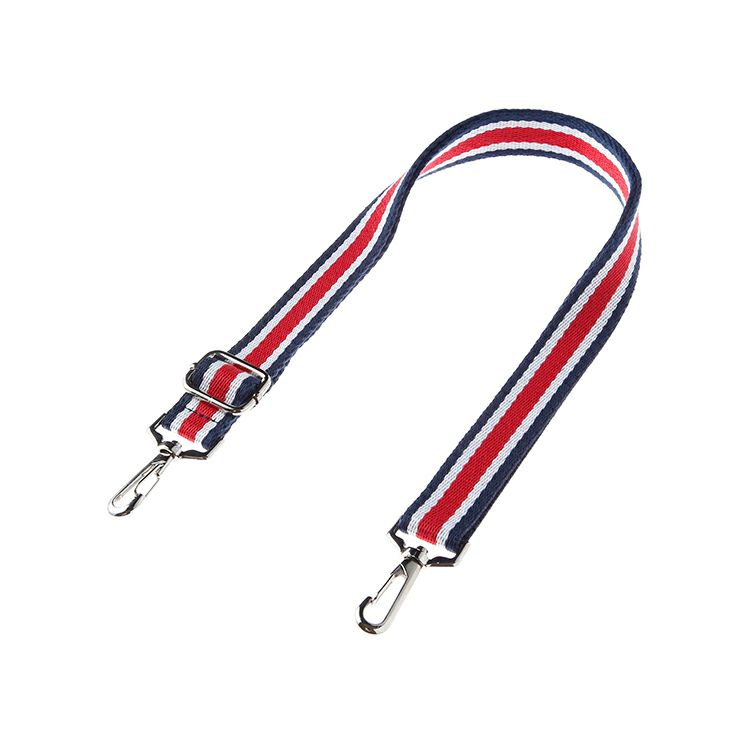A striped shoulder bag strap made of polypropylene with metal swivel hooks and an adjustable buckle on a white background.