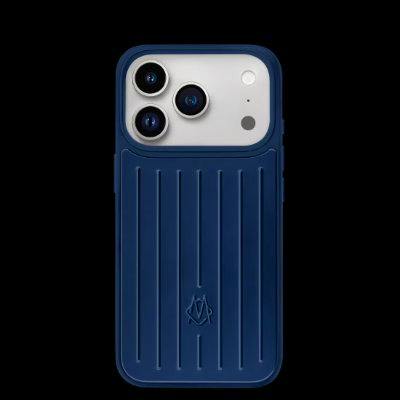 Ink-blue plastic iPhone 18 Pro case installed on the back of an iPhone, showing the camera cutouts.