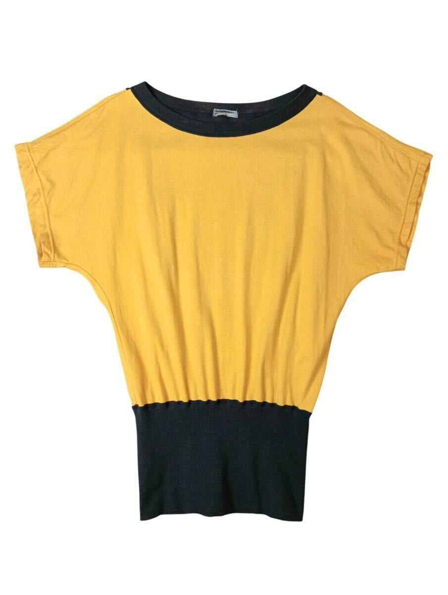 Yellow and black short-sleeve men's cotton T-shirt laid flat showing the front of the Issey Miyake shirt.
