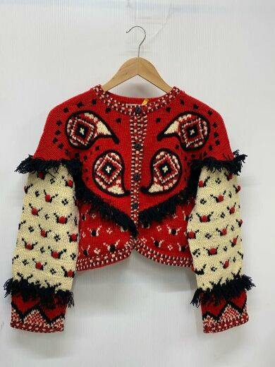 Red Issey Miyake cotton fringe paisley cardigan with animal motifs shown front on a hanger.