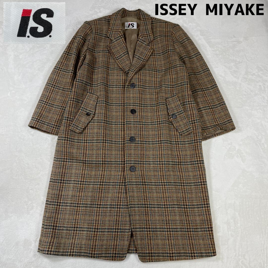 Full-length brown checked wool women's long coat by ISSEY MIYAKE laid flat showing the front, lapel collar, pockets, and three-button closure.