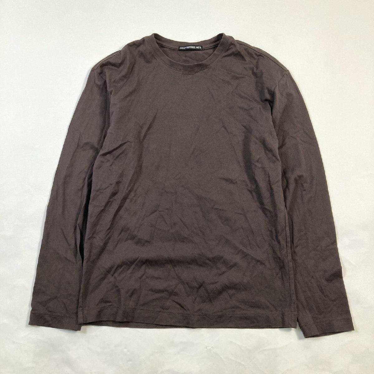Brown ISSEY MIYAKE men's long-sleeve crewneck cotton t-shirt laid flat on a light background.