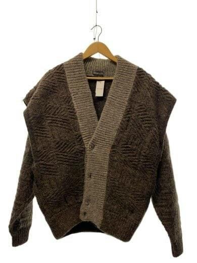 Front view of a brown ISSEY MIYAKE MEN wool cardigan with textured knit and buttoned shawl collar hanging on a wooden hanger against a white background.