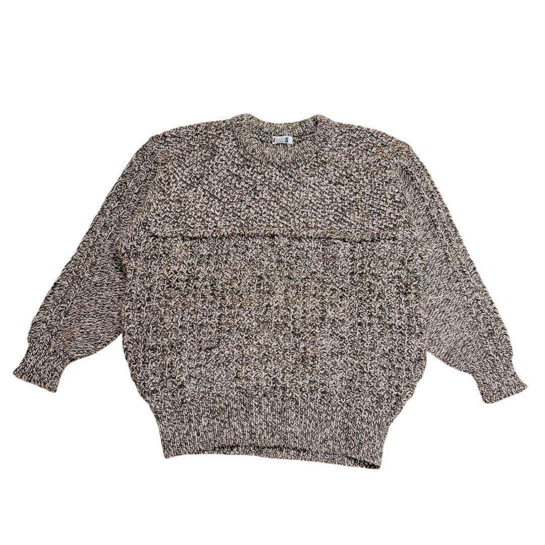 Brown pleated knit sweater laid flat on a white background showing the full front.