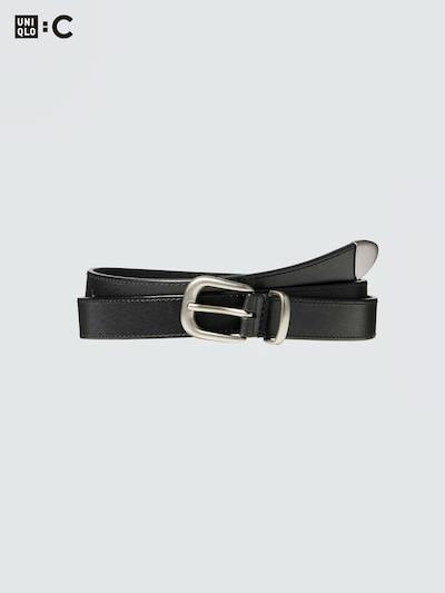 Black Italian leather long belt with a silver buckle laid on a light background.