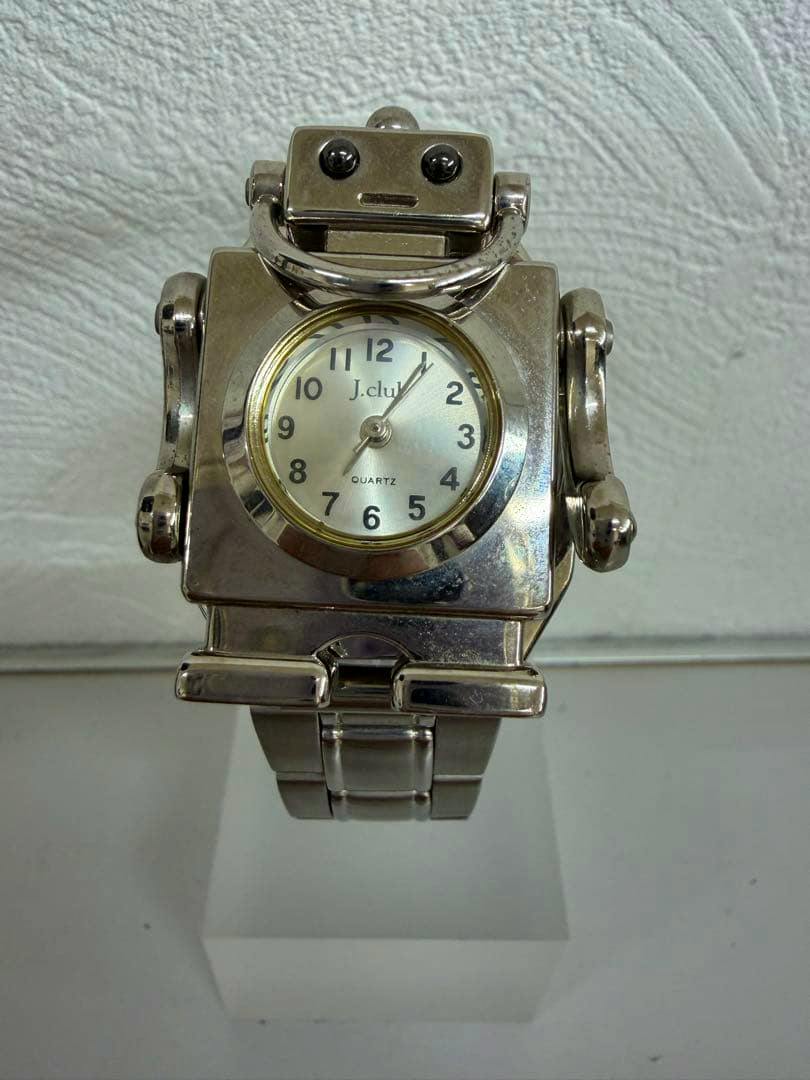 Front view of the j-axis robot retro wristwatch showing the round watch face and metal link band.