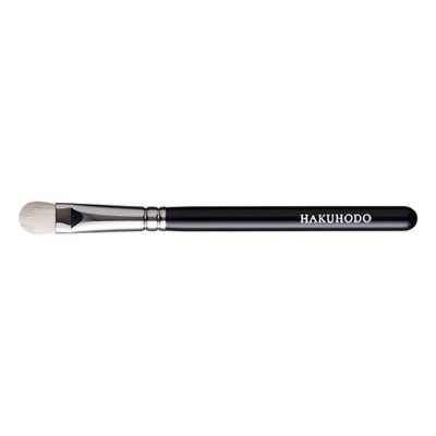 A single J004 eyeshadow makeup brush with white bristles and a black handle on a white background.