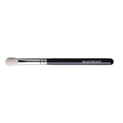 A single Hakuhodo eyeshadow brush with a black handle and rounded white bristles on a white background.