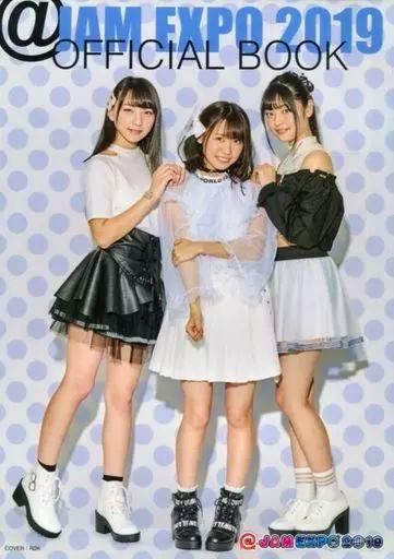 Cover of the @JAM EXPO 2019 OFFICIAL BOOK (pamphlet with CD) showing three women posing against a polka-dot background.