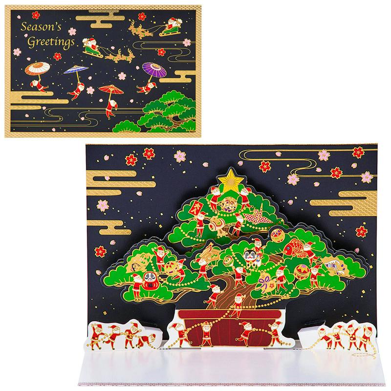 Opened pop-up greeting card showing a bonsai tree with many small Santa figures and gold-lined decorative elements.
