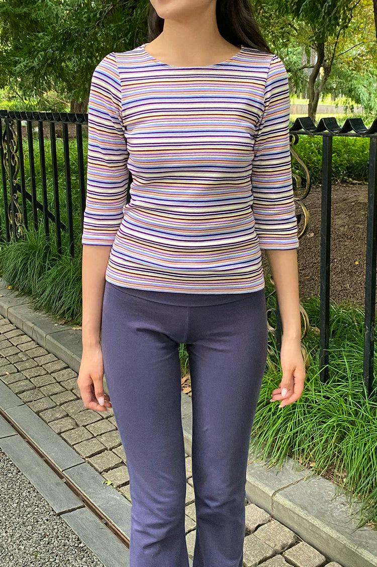 Front view of a person wearing the Jennie Striped Top, a striped cotton T-shirt, shown from neck to hips.