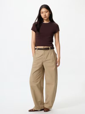 Front view of a woman wearing the women's polyester barrel-leg pants.