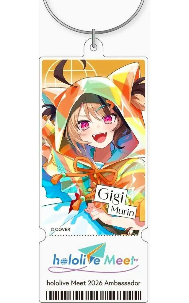 Rectangular acrylic ticket-style keychain showing a colorful illustration of Gigi Murin, a metal ring, and the hololive Meet 2026 logo.