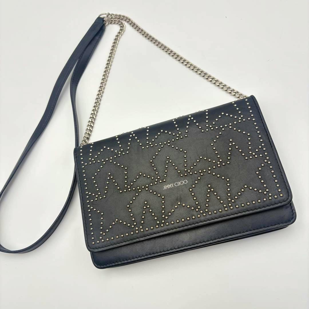 Black Jimmy Choo studded cow leather shoulder bag shown front with chain-and-leather shoulder strap.