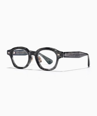 Front three-quarter view of JINS UKIYO glasses with a dark marbled round frame on a white background.