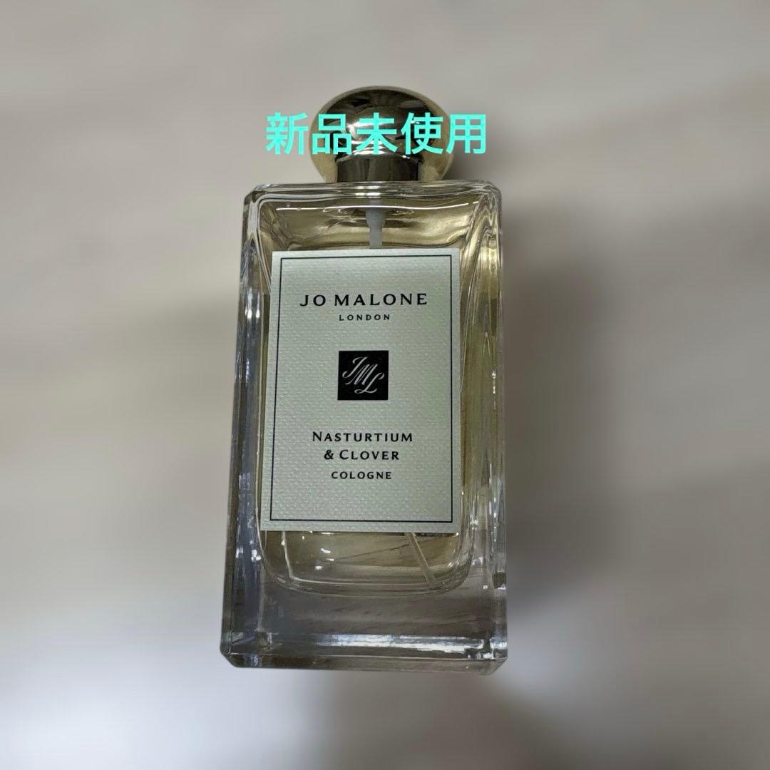 Front view of a Jo Malone London Nasturtium & Clover 100ml cologne bottle with its label and cap visible.