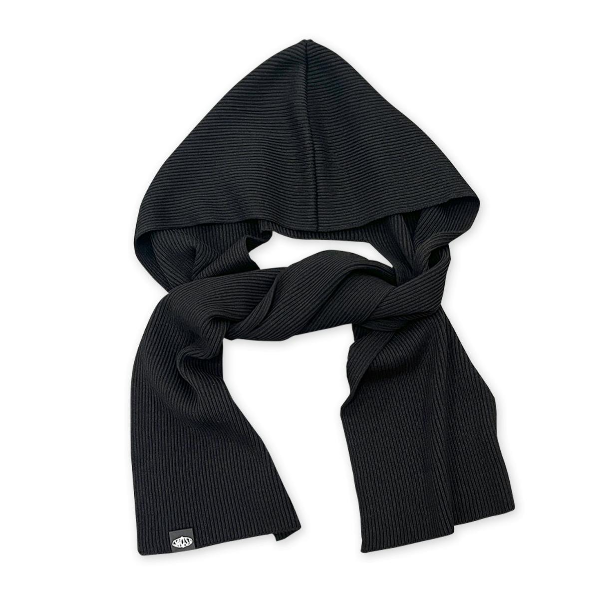 Black ribbed acrylic hooded scarf laid flat showing the hood and attached long scarf sections.