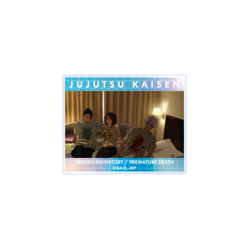 Mini acrylic block showing an illustration of three characters sitting on a couch with a "JUJUTSU KAISEN" header.