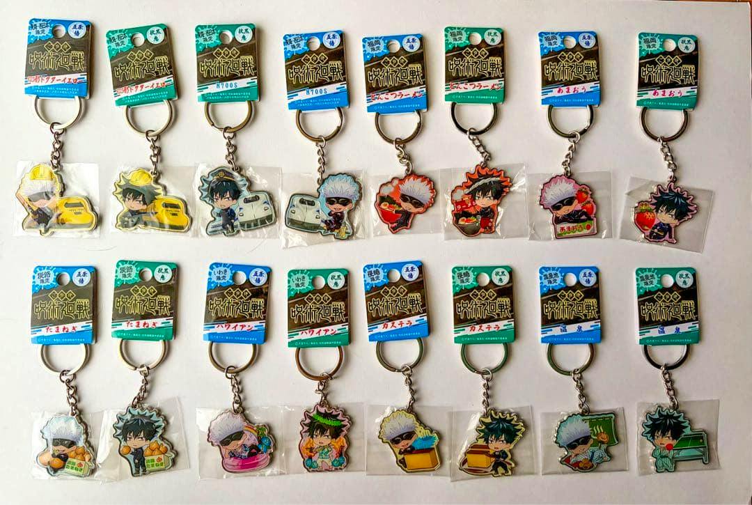 Multiple sealed metal Jujutsu Kaisen character keychains (bag charms) arranged on a white background with product hang tags.
