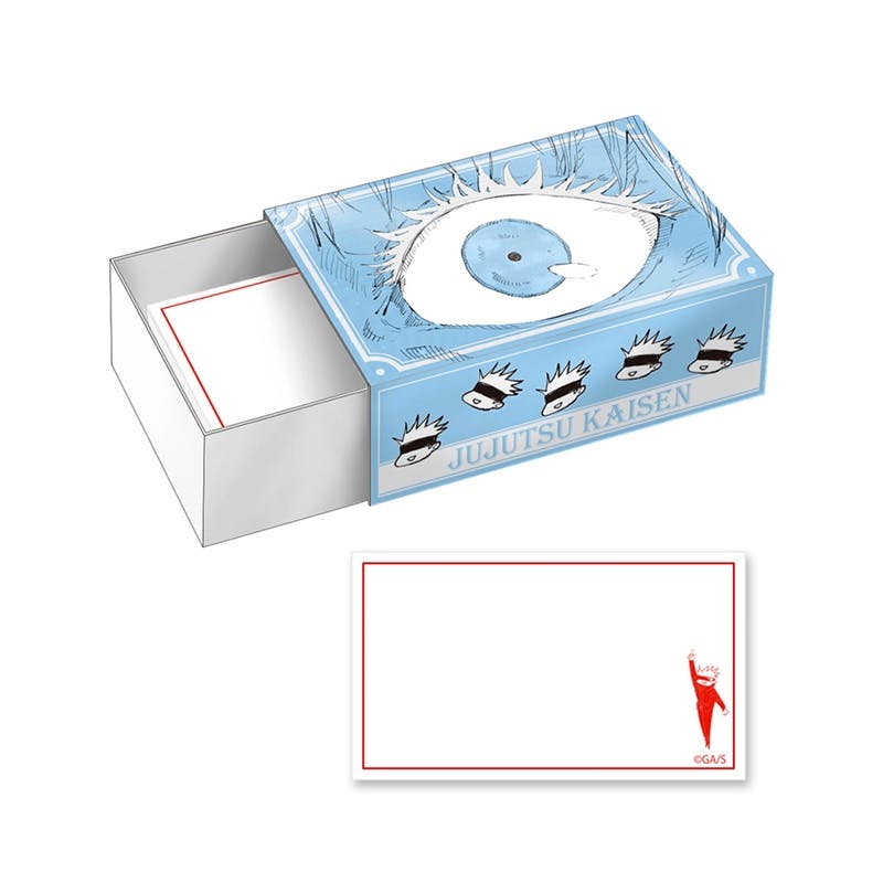 A Jujutsu Kaisen matchbox-style memo pad with a blue illustrated sleeve featuring an eye motif and a small white memo card with a red border.