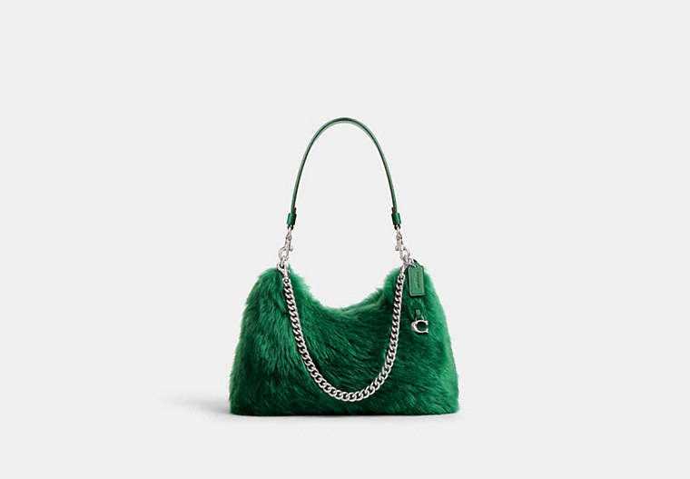 Green sheepskin leather and wool shoulder bag with a chain detail shown on a white background.