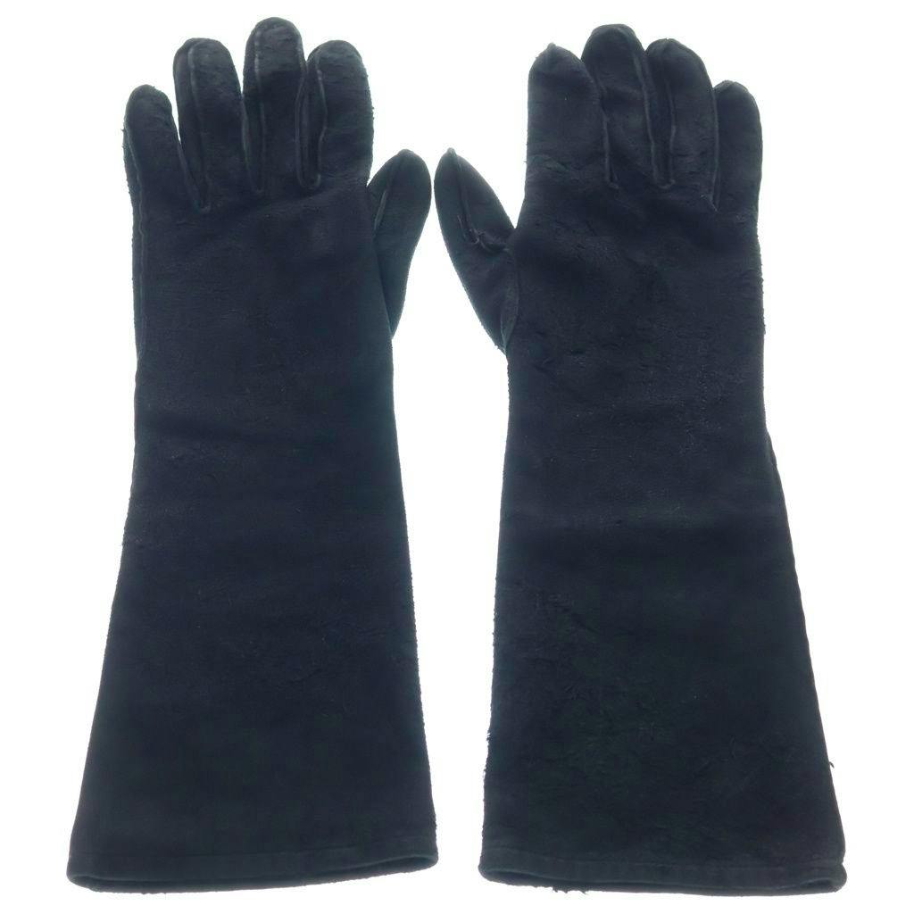 Pair of long black lamb reverse leather gloves laid flat on a white background.