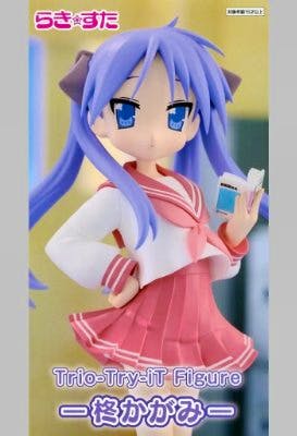 Front-view photo of the Trio-Try-iT plastic figure of 柊かがみ (らき☆すた) in a school uniform holding a small book.