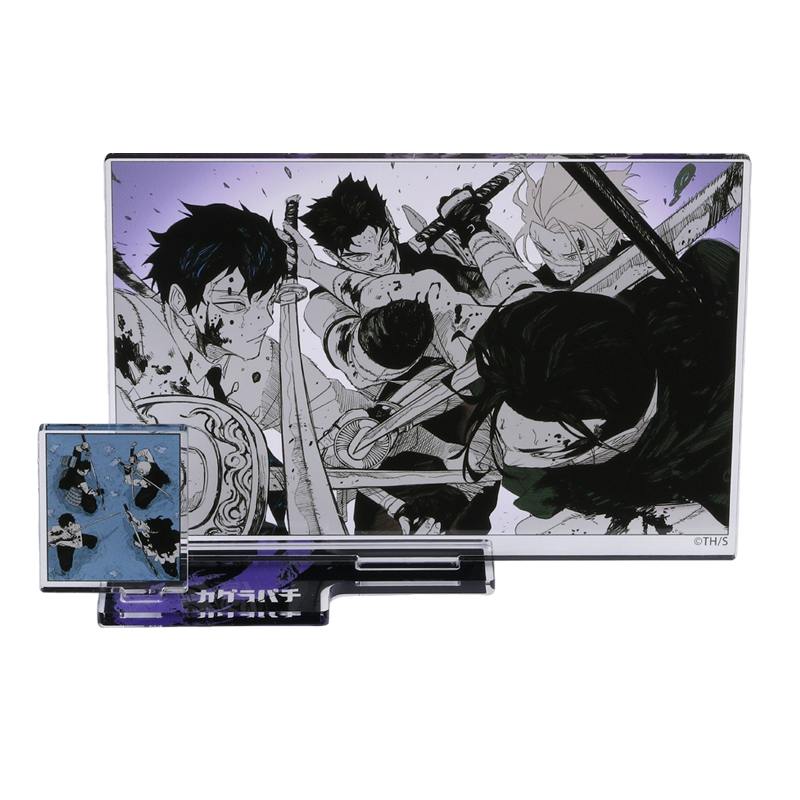 A clear acrylic diorama decorative stand showing a printed panel with a black-and-white manga-style illustration of multiple characters and a small square acrylic piece mounted on a clear base.