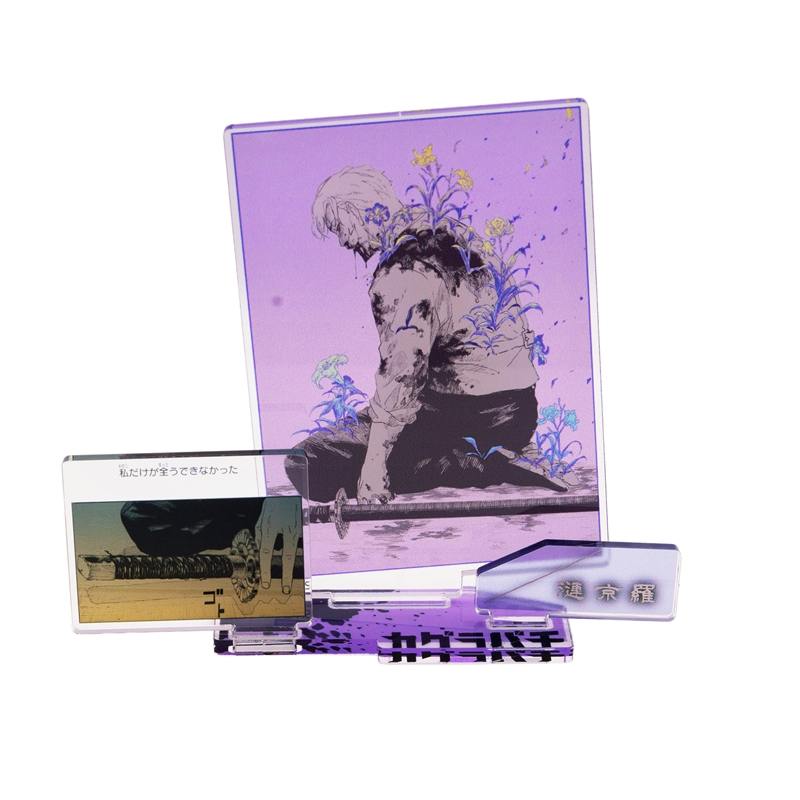 Purple-toned acrylic diorama stand showing a seated character illustration on a base with a small scene card and a nameplate.