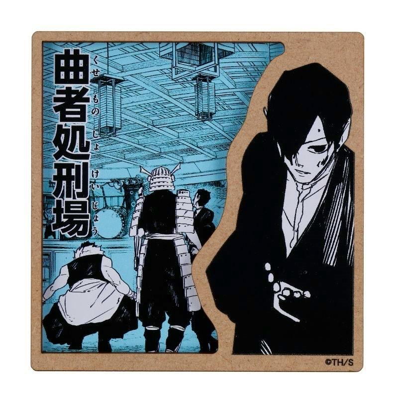 Square fridge magnet showing manga-style black-and-white characters and vertical Japanese text on a blue background with a brown border.
