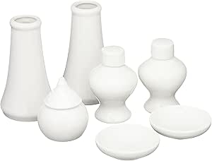 Seven white porcelain ritual vessels and offering dishes arranged on a white background.