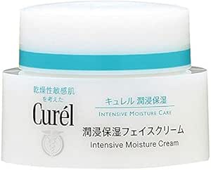 A white jar of Kao Currel Moisturizing Face Cream with a teal band on the lid and English and Japanese labeling on the packaging.