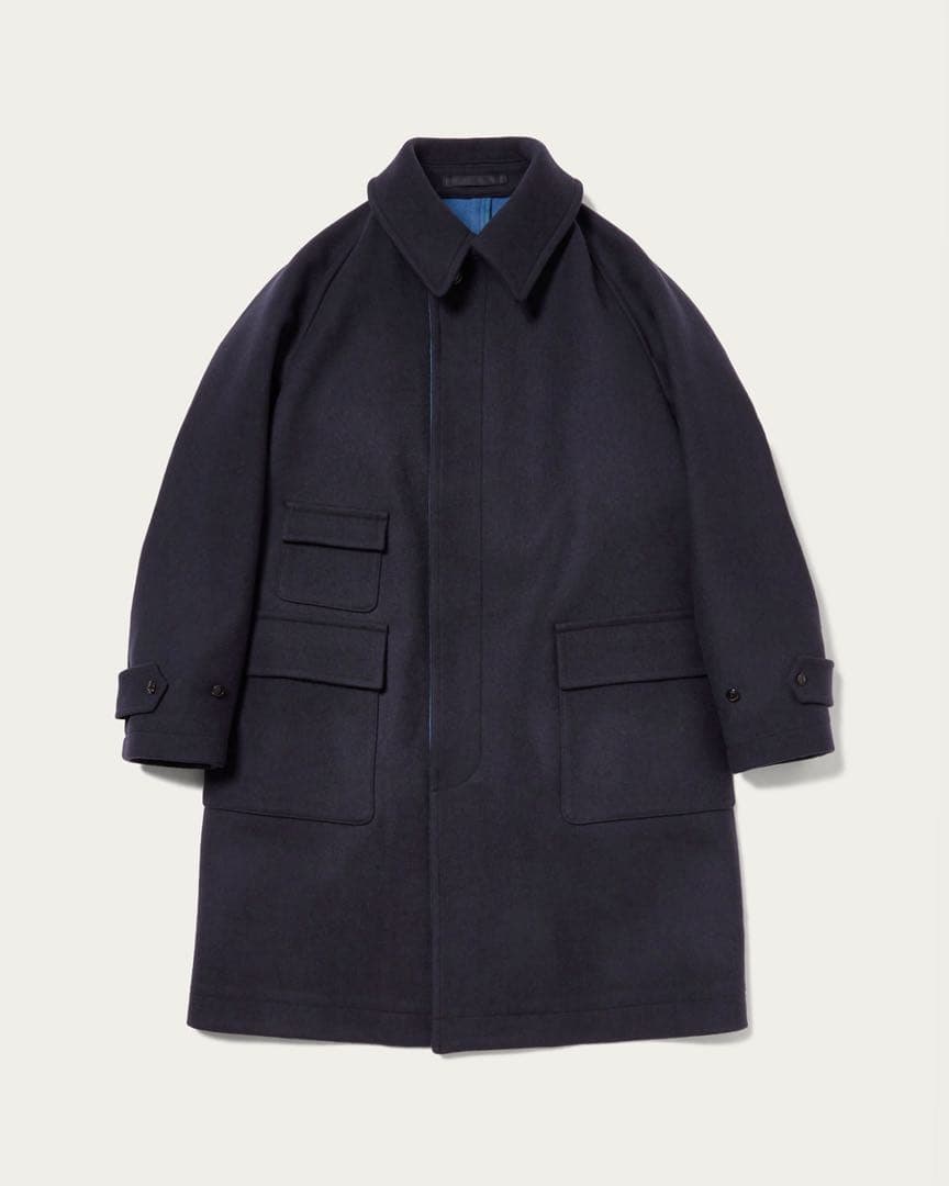 A men's wool traveler coat shown flat on a light background from the front.