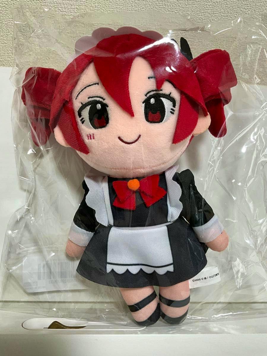 A clear-photo of the 重音テト (Teto) plush wearing a maid outfit inside its plastic packaging.