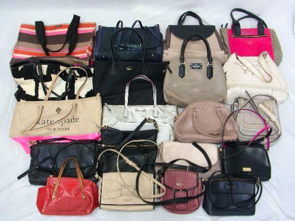 Assorted kate spade women's handbags and shoulder bags laid out together on a white surface.