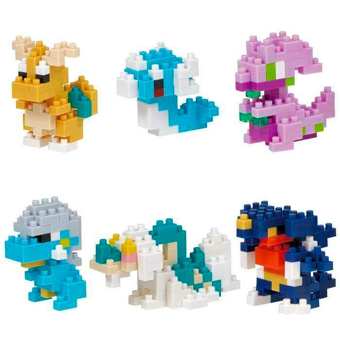Six assembled nanoblock mini Pokémon dragon-type plastic models in various colors on a white background.