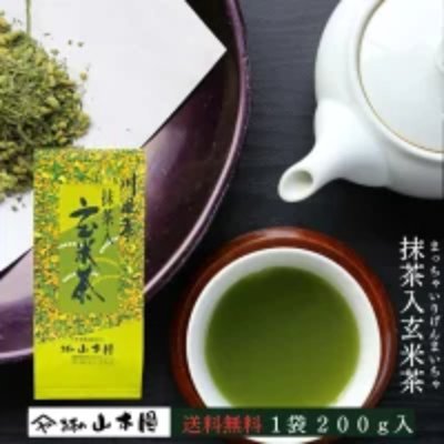 A 200g package of matcha-infused genmaicha displayed beside a cup of brewed green tea and a teapot.