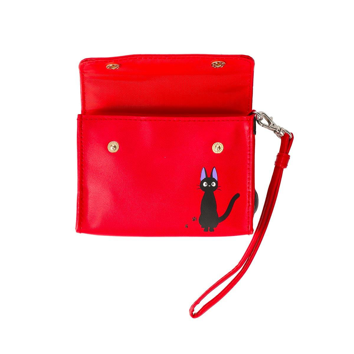 Red synthetic leather pouch with a black cat illustration, open flap with gold snaps, and a red wrist strap.