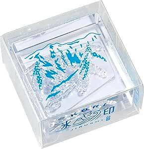 Clear square plastic stamp showing a raised mountain-style ice print design inside.