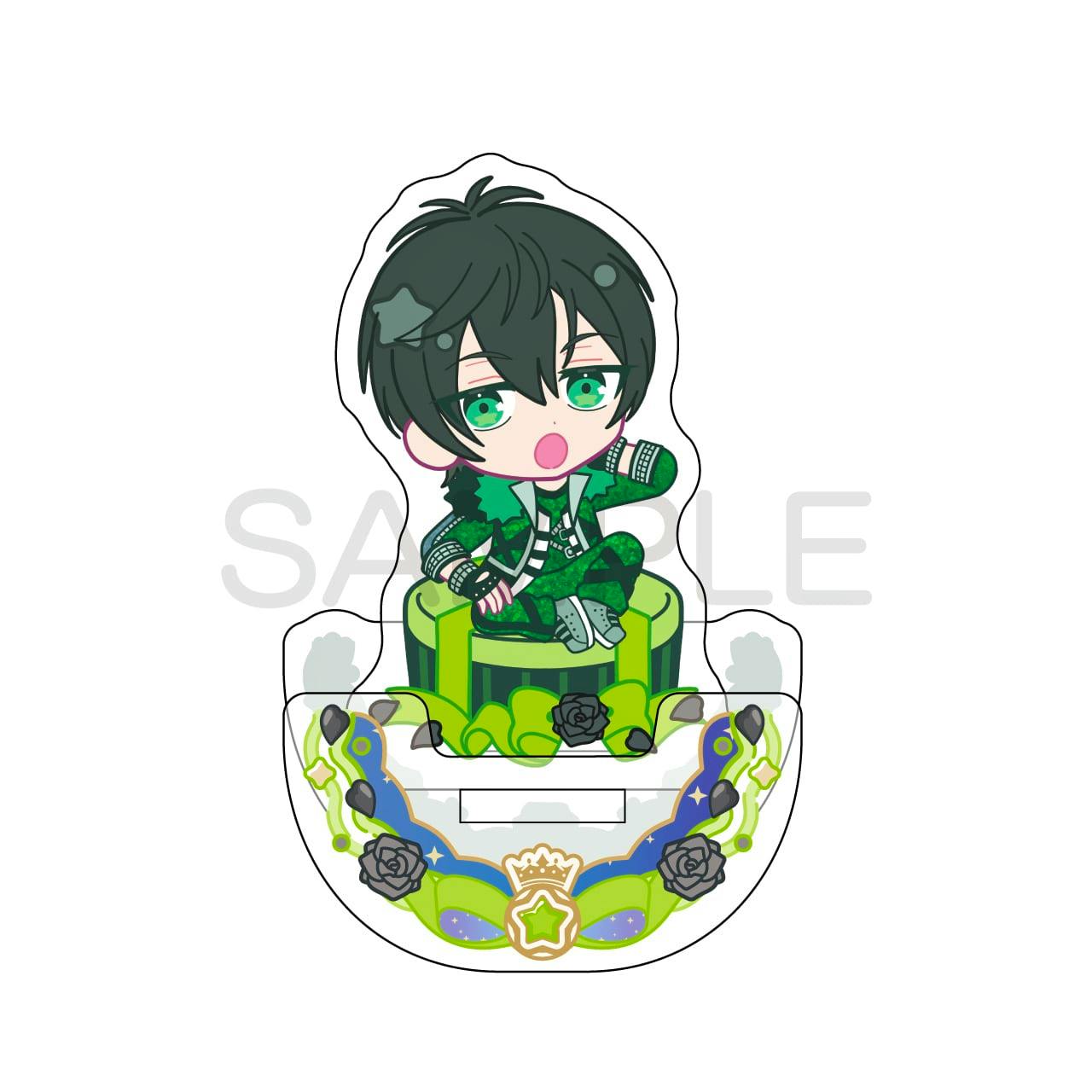 Front view of the acrylic decorative stand showing a chibi illustration of 香賀美タイガ sitting on a green pedestal with a decorative base.