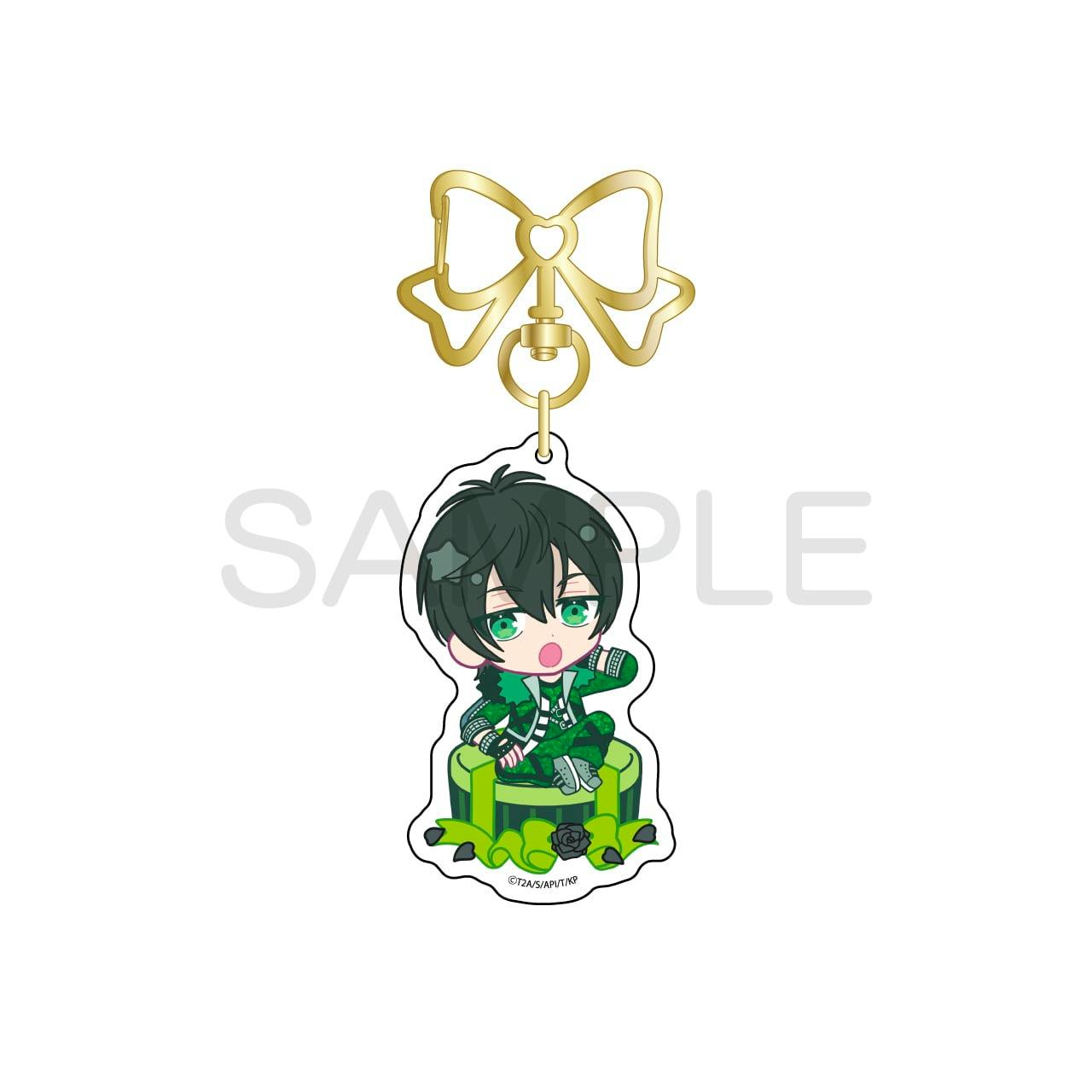 A KING OF PRISM acrylic keychain (きゃらっぴん) showing the character 香賀美タイガ with a gold bow clasp on a white background.