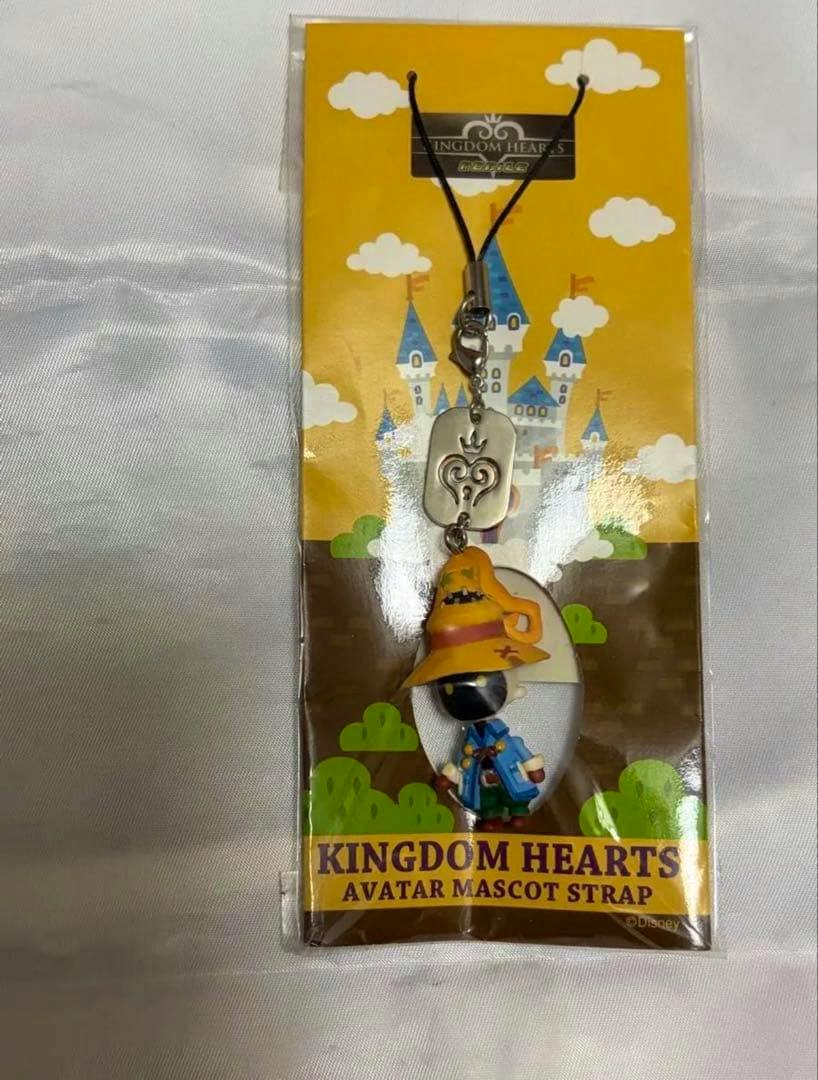 Packaged Kingdom Hearts avatar mascot strap keychain showing the Vivi character attached to a yellow backing card.