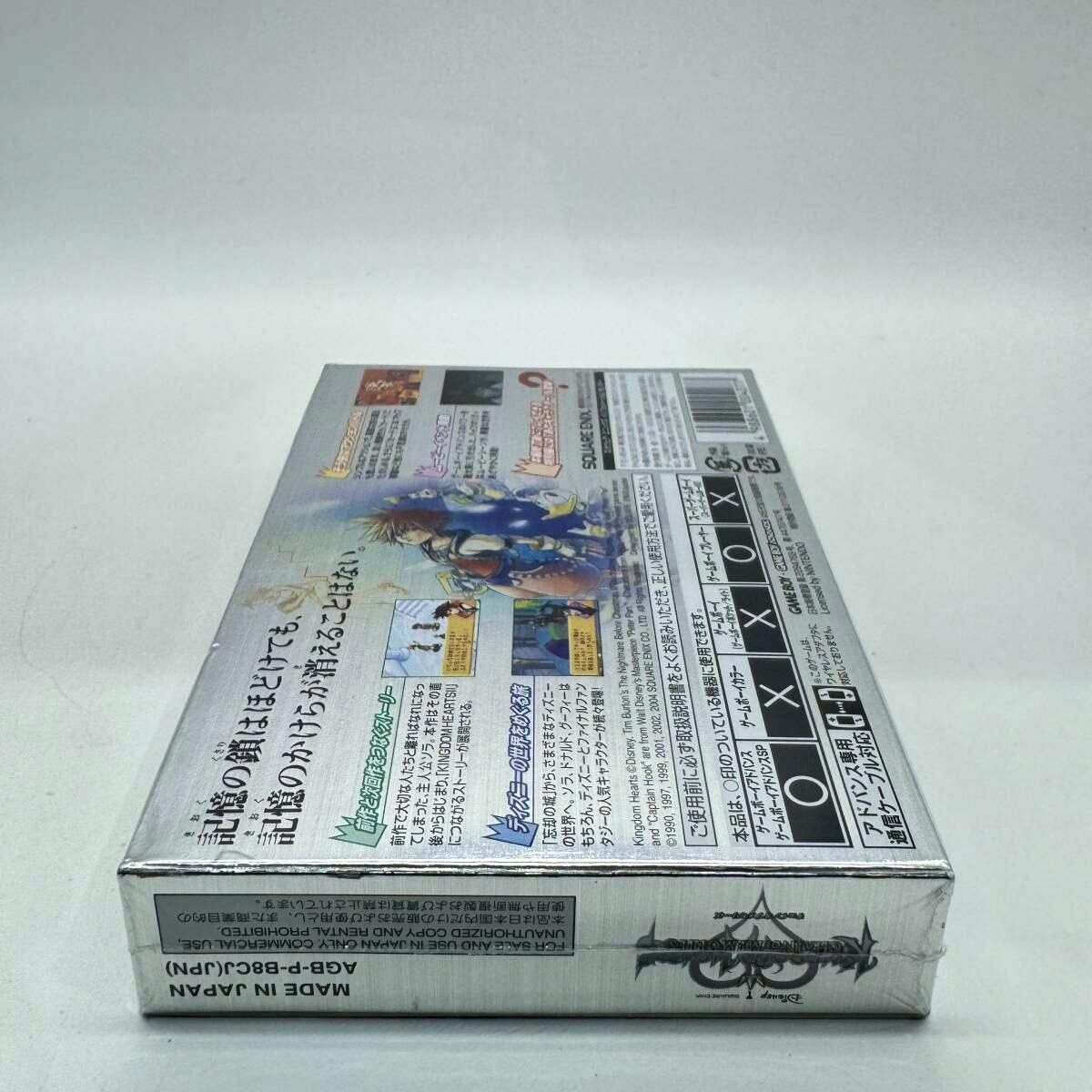 Back of the Game Boy Advance "Kingdom Hearts: Chain of Memories" boxed game in a protective case showing Japanese back cover art and text.