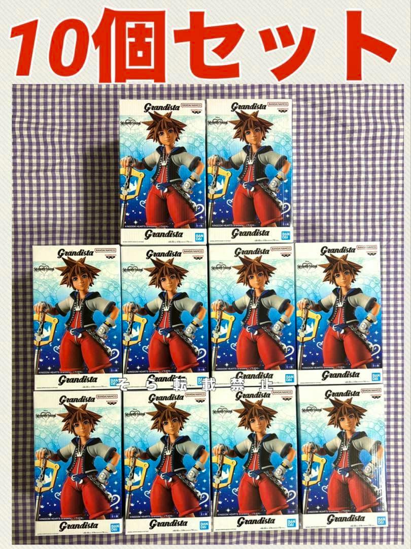 Ten boxed Grandista Sora (Kingdom Hearts) figure boxes arranged in a grid on a checkered cloth background.