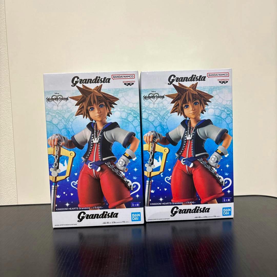 Two boxed Grandista Sora figures side by side, showing the box artwork of Sora holding his Keyblade.