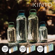 Several clear KINTO water bottles in different sizes displayed outdoors on a wooden surface.